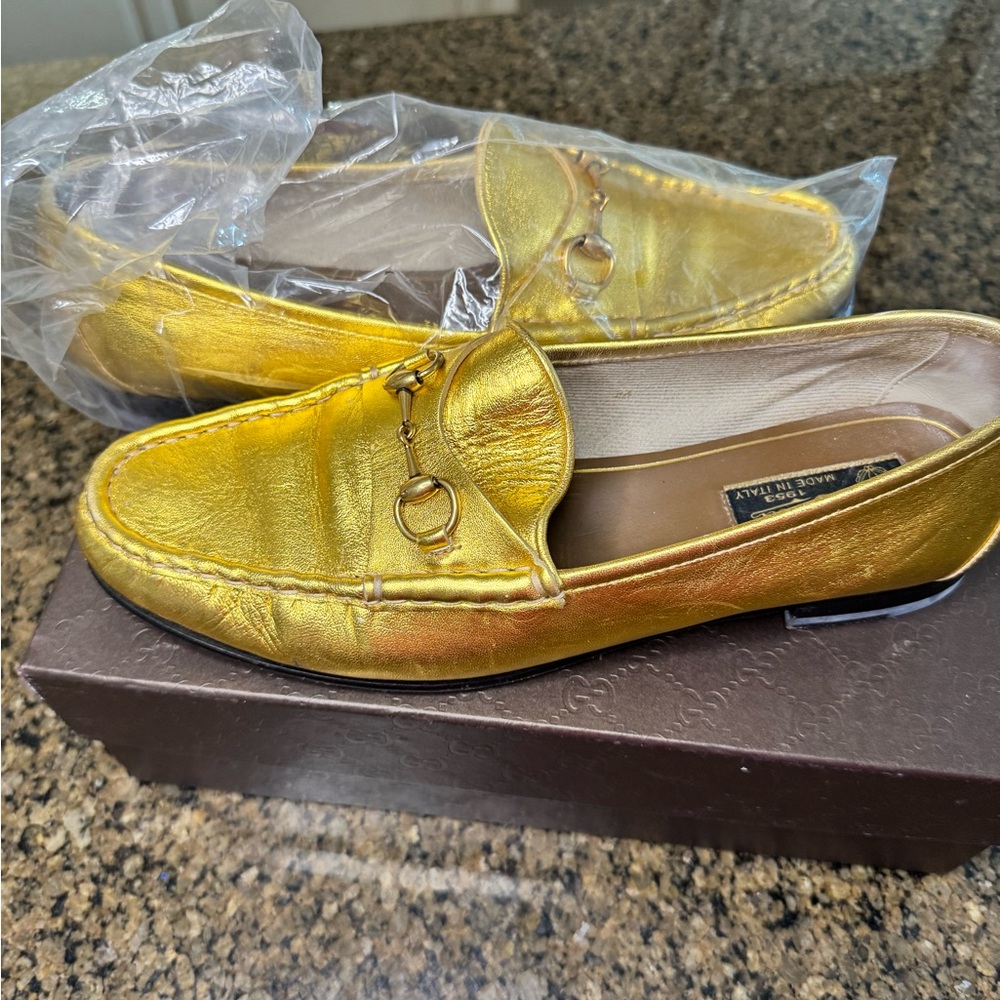 Gucci Gold Leather Loafers